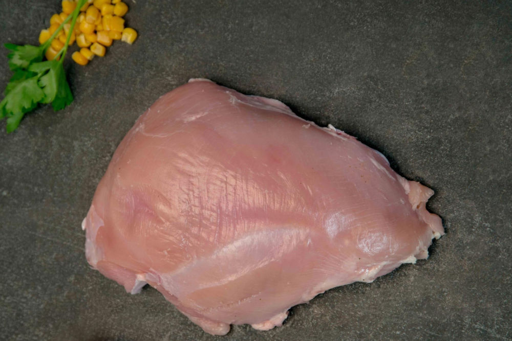 Tagliere con Petto tacchino Carni bianche macelleria Musso